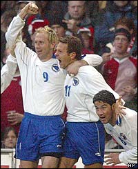 Sergej Barbarez, Bosnia's  first goalscorer, and Elvir Baljic, their second, celebrate a surprise victory against Denmark