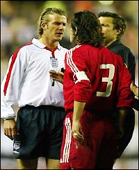 England captain David Beckham  has words with Turkey's Bulent