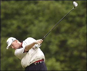 Ernie Els tees off