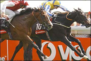 Kevin Darley takes the Vodafone Woodcote Stakes on  Parkview Love after a close finish 