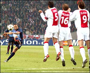 Thierry Henry scores a free-kick against Ajax