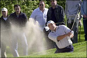 Angel Cabrera plays out of a bunker