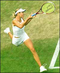 Maria Sharapova  in action in the second round at Wimbledon