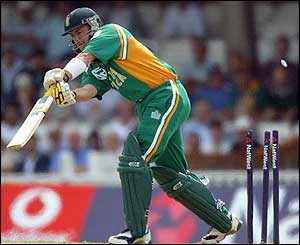 Herschelle Gibbs is bowled for five by James Anderson  