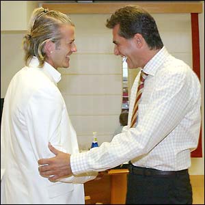 Real Madrid's new midfielder David Beckham and new coach Carlos Queiroz                              