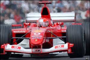 Michael Schumacher goes from fifth to third  late on in the French GP 