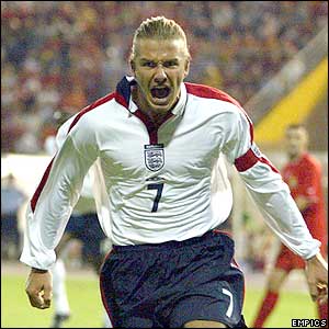 David Beckham celebrates after scoring his  penalty 