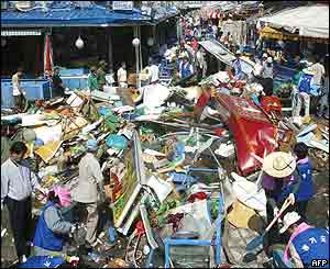 South Korean people and soldiers clean up downtown for restorations in Masan 