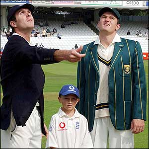 Michael Vaughan tosses the coin but loses and South Africa put England into bat  