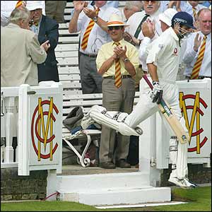 Michael  Vaughan gets a round of applause as he comes out to bat 