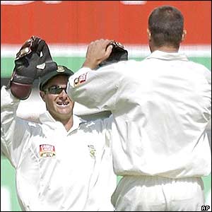 Boucher celebrates with Andrew Hall after Hall removes Andrew  Flintoff