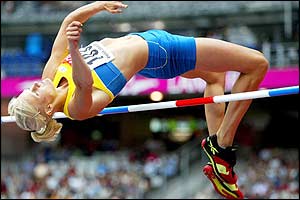 Carolina Kluft clears the high jump  at 1.94m