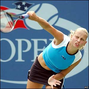 Jelena Dokic serves as she beats  Emmanuelle Gagliardi 