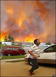People flee fires