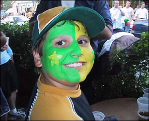 A young Wallabies fan celebrates victory