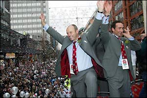 England coach Clive Woodward  celebrates with fans