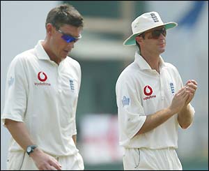England spinner Ashley Giles and captain Michael Vaughan contemplate their options