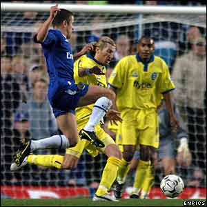 Chelsea's Joe Cole is tackled by Birmingham's Robbie Savage