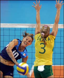 Italian Paola Paggi spikes against Brazilian Erika Coimbra during a preliminary pool A match 