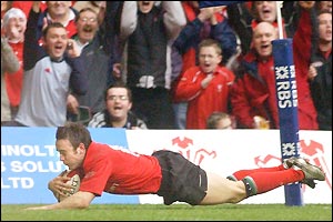 Rhys Williams dives over in the corner  to score Wales' second try