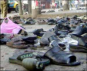 Grenade lies among abandoned shoes