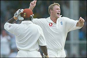 Andrew Flintoff celebrates the removal of Shivnarine Chanderpaul  