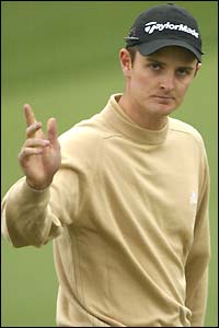 Justin Rose celebrates a birdie at Augusta