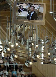 Jack McConnell is shown on a television  screen