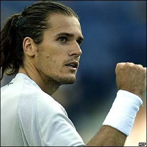 Tommy Haas celebrates reaching the quarter-finals