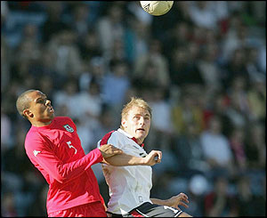 Wales'  Danny Gabbidon challenges Norway's Bengt Saeternes 