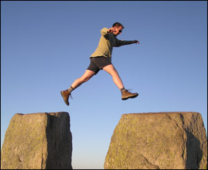 Robert Ansell  jumping from Eve to Adam at the top of Tryfan