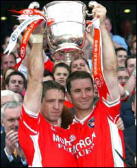 Skipper Kieran McGeeney called up  Paul McGrane to accept the cup 
