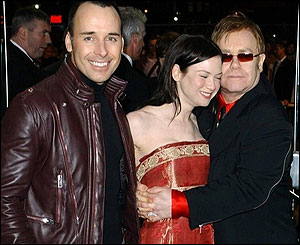Renee Zellweger, Sir Elton John, and  David Furnish. 