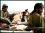Taleban soldiers pictured prior to surrender