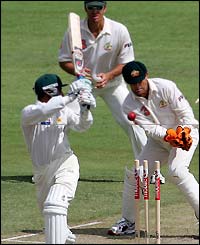 Razzaq watches his stumps fly