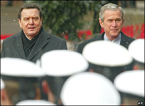 President Bush and Chancellor Schroeder review the guard of honour at the Electors Palace in Mainz