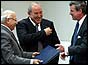 Chief Justice Midhat Al-Mahmodi, Prime Minister Iyad Allawi and Paul Bremer  