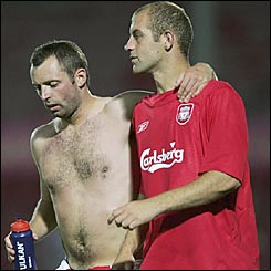 TNS defenders Tommy Holmes (L) and Steve Evans at the end of the UEFA Champions League  match