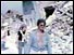People walk through ruins of Friuli, Italy