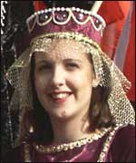 IN costume for the procession