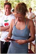 Signing those autographs...