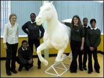 Pupils take delivery of their horse