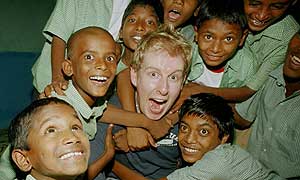 Patrick Kielty with children in India