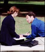 Couple studying outside