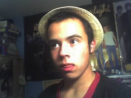 Sean with a paper plate on his head