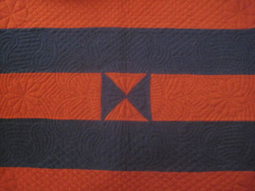 Stripey flannel quilt produced in Ethiopia