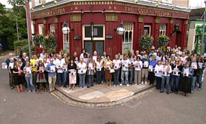 Members of the EastEnders cast and crew in Albert Square