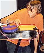 Picture: Kid Carpet gets to grips with his toys.