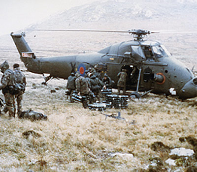 A Royal Navy Wessex 5 helicopter delivers mortar ammunition to the front line during mountain battles above Port Stanley