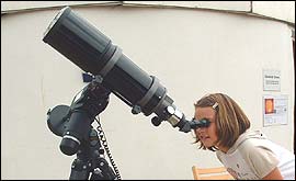 Pic: Sophie looks through one of the powerful telescopes.